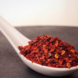 Cuchara llena de ají argentino