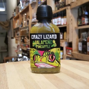 Botella de salsa picante crazy lizard jalapeño pineapple en la tienda de especias Sally Pepper Spices